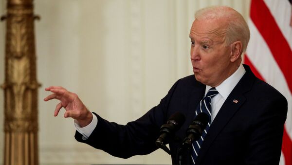 U.S. President Joe Biden takes questions as he holds his first formal news conference in the East Room of the White House in Washington, U.S., March 25, 2021 - Sputnik International