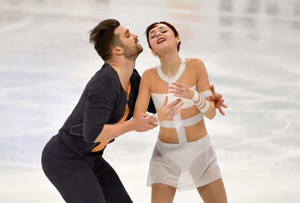 France's Cleo Hamon and Denys Strekalin in action during the pairs free skating final at the World Figure Skating Championship in Stockholm on 25 March 2021.  - Sputnik International