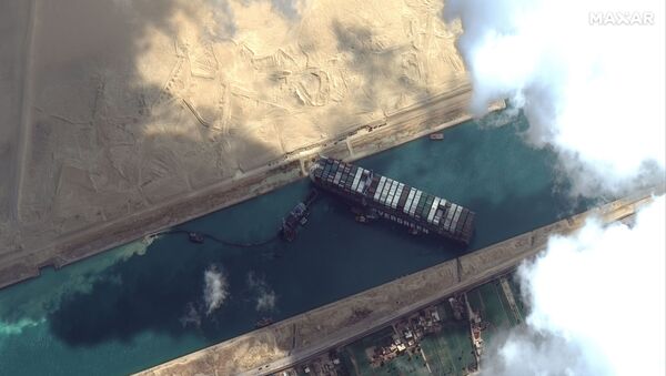 The Ever Given container ship is pictured in the Suez Canal in this Maxar Technologies satellite image, taken on 26 March 2021 - Sputnik International