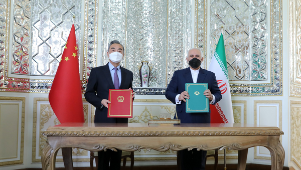 Chinese Foreign Minister Wang Yi and Iranian Foreign Minister Mohammad Javad Zarif sign 'historic' 25-year strategic partnership roadmap. - Sputnik International
