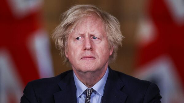 Britain's Prime Minister Boris Johnson holds a news conference at 10 Downing Street, on the day of reflection to mark the anniversary of Britain's first coronavirus disease (COVID-19) lockdown, in London, Britain 23 March 2021 - Sputnik International