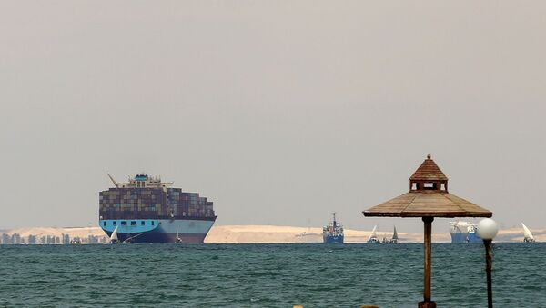Ships are anchored outside the Suez Canal, where a container ship ran aground and blocked traffic, near Ismailia, Egypt, March, 28, 2021. - Sputnik International