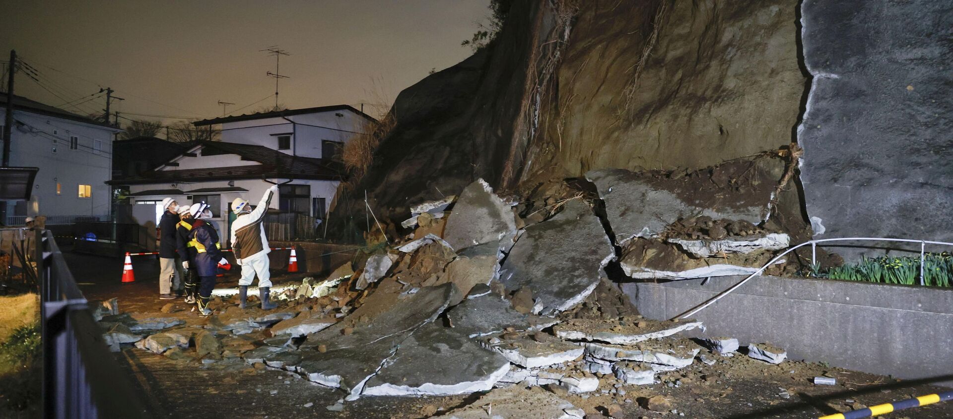 A part of a cliff which collapsed due to an earthquake is pictured in Shiogama, Miyagi prefecture, Japan in this photo taken by Kyodo on March 20, 2021. - Sputnik International, 1920, 28.03.2021