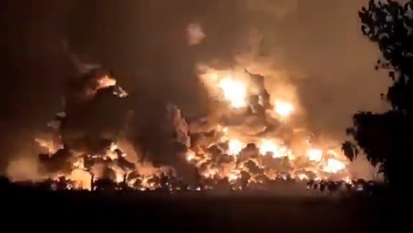 Screenshot from a video showing the moment of a massive explosion hitting Balongan oil refinery in Indramayu region, Indonesia - Sputnik International
