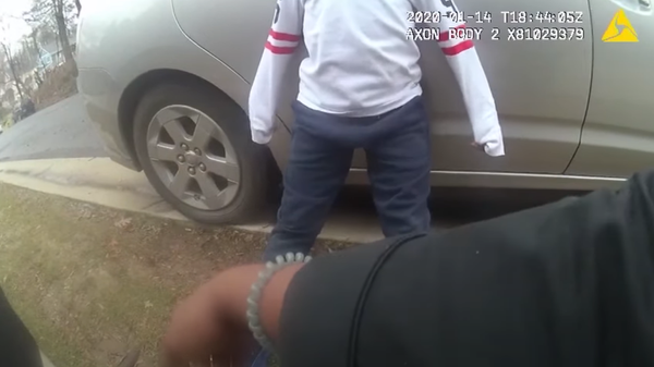 Screenshot from the body-camera footage released by Montgomery County Police Department, showing two police officers berating a 5-year-old boy - Sputnik International
