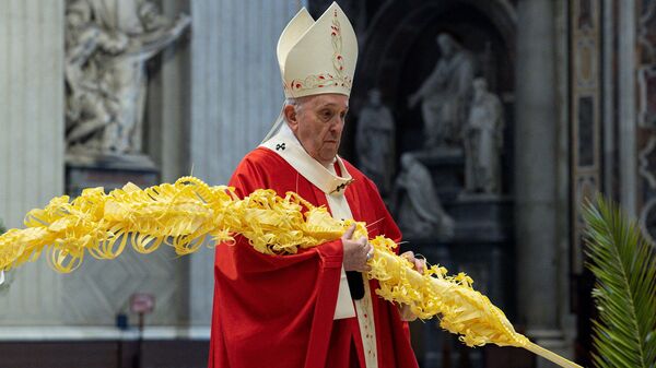 Pope Francis holds mass on Palm Sunday at the Vatican with a limited number of faithful as strict COVID-19 restrictions remain in place over the Easter period, in St. Peter's Basilica at the Vatican, March 28, 2021 - Sputnik International