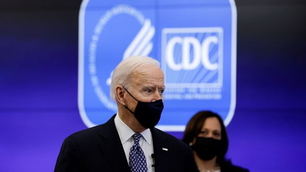 U.S. President Joe Biden and Vice President Kamala Harris receive an update on the fight against the coronavirus disease (COVID-19) pandemic as they visit the Centers for Disease Control and Prevention (CDC) in Atlanta, Georgia, U.S., March 19, 2021 - Sputnik International