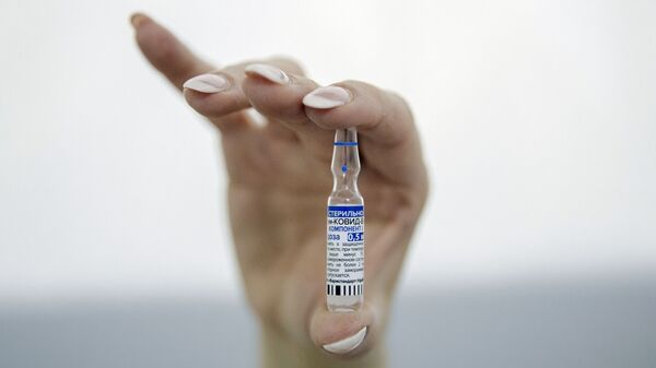 An ampoule containing the Gam-Covid-Vak (Sputnik V) vaccine during vaccination against COVID-19 with the Russian drug Sputnik V at a vaccination point deployed in the building of the Belgrade Expo Center. - Sputnik International