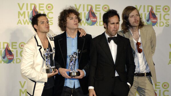 The Killers display the best new artist in a video award they won at the MTV music video awards in Miami 28 August 2005 for their song Mr. Brightside. - Sputnik International