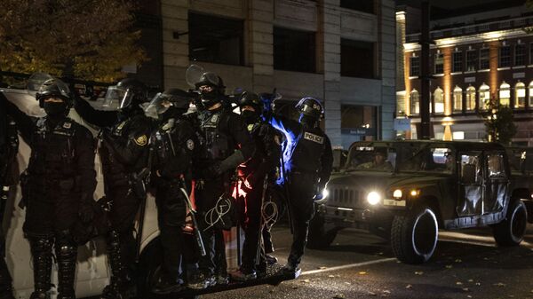 Police join the national guard during protests following the Nov. 3 presidential election in Portland, Or. Wednesday, Nov. 4, 2020. - Sputnik International
