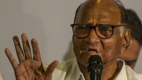 National Congress party president Sharad Pawar gestures as he speaks during a press conference in Mumbai on November 12, 2019.  - Sputnik International
