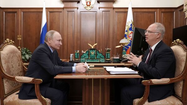 Russian President Vladimir Putin attends a meeting with head of the Russian Direct Investment Fund Kirill Dmitriev in Moscow, Russia April 2, 2021 - Sputnik International