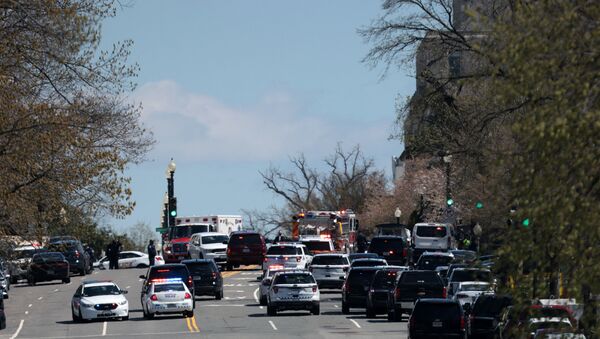  Emergency vehicles on scene after a vehicle charged a barricade at the U.S. Capitol on April 02, 2021 in Washington, DC. The U.S. Capitol was locked down after a person reportedly rammed a vehicle into two Capitol Hill police officers. A suspect was apprehended.  - Sputnik International