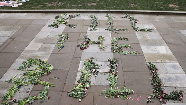 Flowers that spell out the word Kill the Bill are seen on the floor on Parliament Square in London, Britain, March 17, 2021.  - Sputnik International