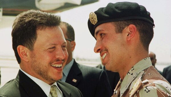 Jordan's King Abdullah II laughs with his brother Crown Prince Hamzeh, right, on Monday, April 2, 2001, shortly before the Jordanian monarch embarked on a tour of the United States - Sputnik International