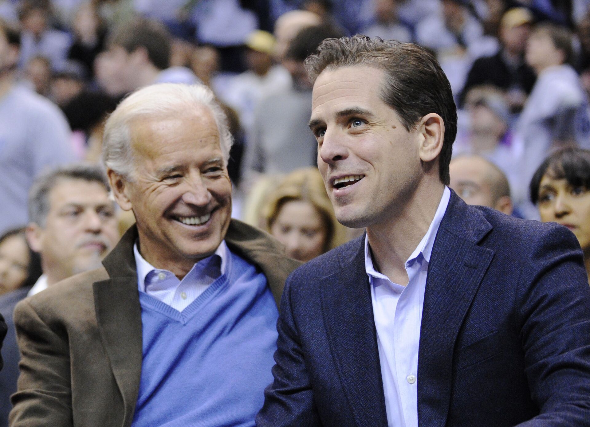 Then Vice President Joe Biden, left, and his son Hunter Biden appear at the Duke Georgetown NCAA college basketball game in Washington on Jan. 30, 2010. - Sputnik International, 1920, 29.09.2023