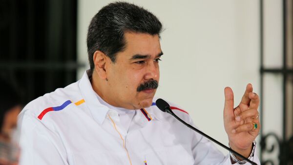 Venezuela's President Nicolas Maduro gestures during a state television address, in Caracas, Venezuela March 28, 2021. - Sputnik International