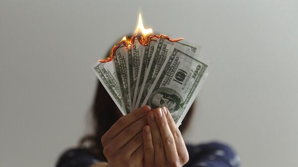 Dollars burn  - Sputnik International