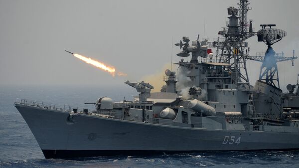 A rocket is fired from the Indian Navy destroyer ship INS Ranvir during an exercise drill in the Bay Of Bengal off the coast of Chennai on April 18, 2017 - Sputnik International