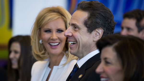 In this Jan. 1, 2015 file photo, New York Gov. Andrew Cuomo and his girlfriend Sandra Lee smile during an inaugural ceremony at One World Trade Center in New York - Sputnik International