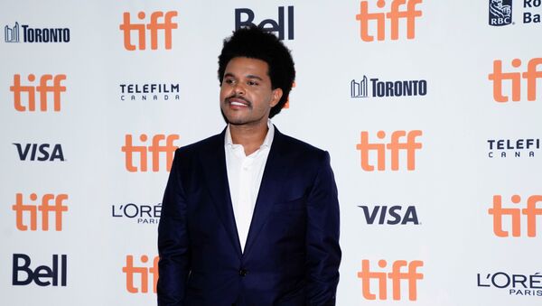 FILE PHOTO: Abel Makkonen Tesfaye, known as The Weeknd, arrives at the international premiere of Uncut Gems at the Toronto International Film Festival (TIFF) in Toronto, Ontario, Canada September 9, 2019. - Sputnik International
