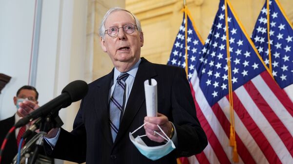 Senate Minority Leader Mitch McConnell speaks to reporters after the Senate Republican lunch on Capitol Hill in Washington, U.S., March 23, 2021 - Sputnik International