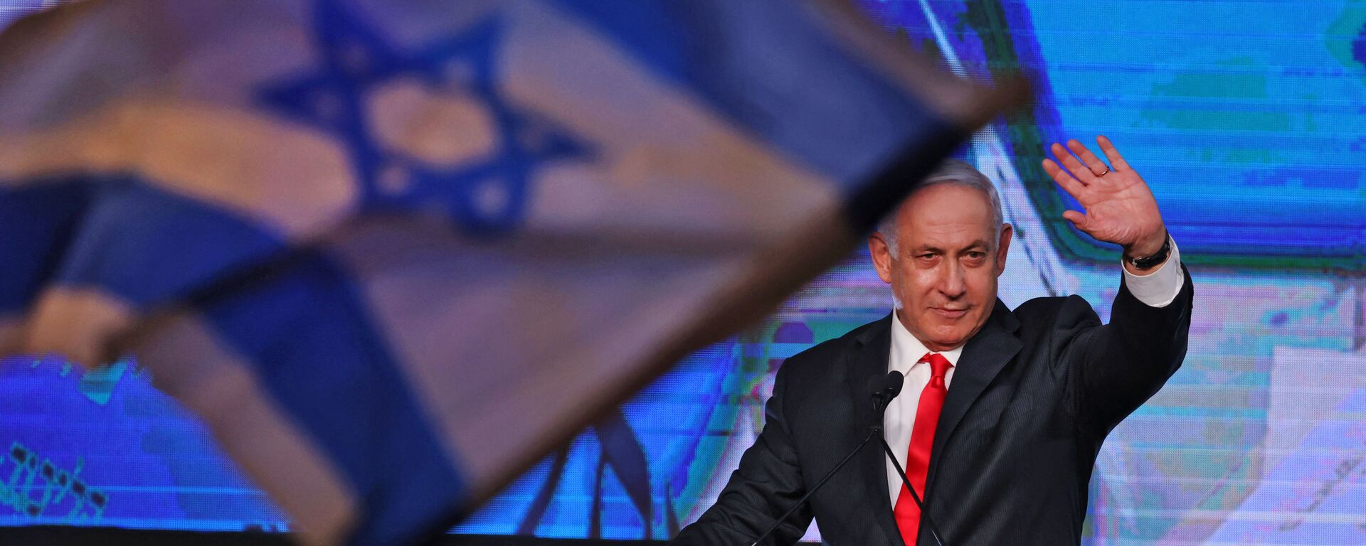 In this file photo taken on 24 March 2021, Israeli Prime Minister Benjamin Netanyahu, leader of the Likud party, addresses supporters at the party campaign headquarters in Jerusalem after the end of voting in the fourth national election in two years. - Sputnik International, 1920, 20.04.2021