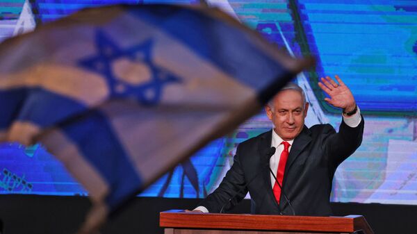 In this file photo taken on March 24, 2021, Israeli Prime Minister Benjamin Netanyahu, leader of the Likud party, addresses supporters at the party campaign headquarters in Jerusalem after the end of voting in the fourth national election in two years. - Sputnik International
