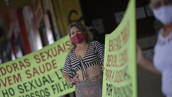 Sex workers protest at Rua Guaicurus, the main bohemian area of Belo Horizonte, in the state of Minas Gerais, Brazil on 5 April 2021, asking to be considered a priority group to receive the vaccine against COVID-19 - Sputnik International