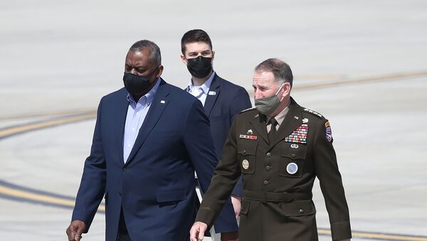 U.S. Defense Secretary Lloyd Austin walks with United States Forces Korea Gen. Robert B. Abrams after arriving at Osan Air Base in Pyeongtaek, South Korea March 17, 2021 - Sputnik International
