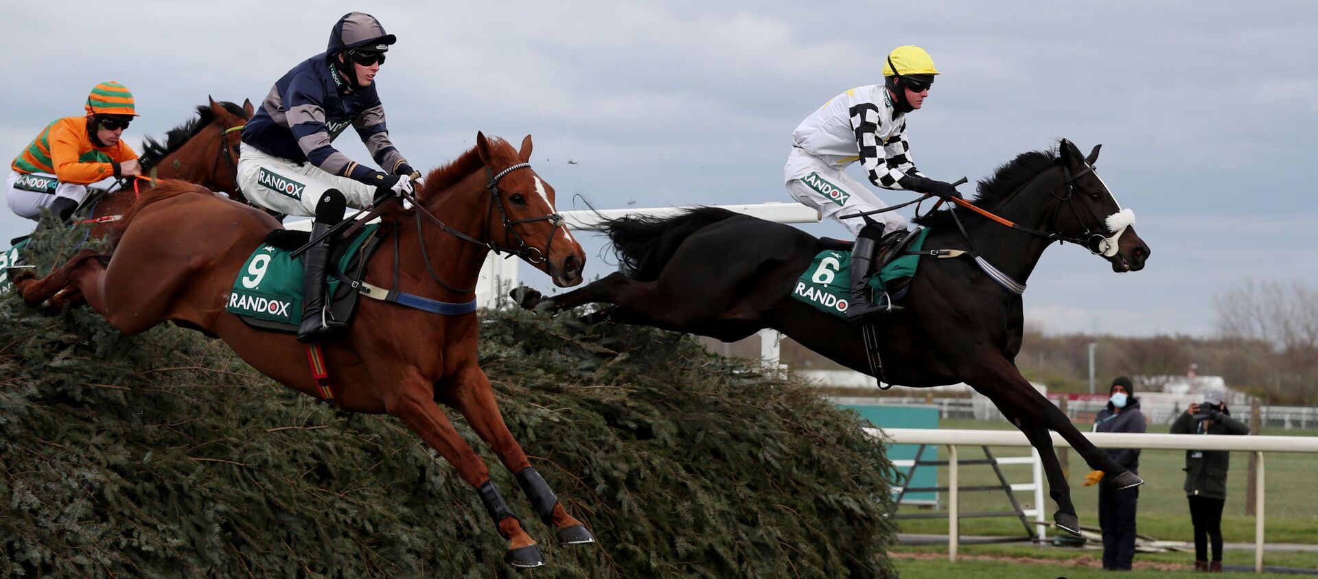 Horse Racing - Grand National Festival - Aintree Racecourse, Liverpool, Britain - April 8, 2021 Cousin Pascal ridden by James King clears the chair on their way to winning the 4:05 Rose Paterson Randox Foxhunters’ Open Hunters’ Chase - Sputnik International, 1920, 09.04.2021