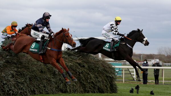 Horse Racing - Grand National Festival - Aintree Racecourse, Liverpool, Britain - April 8, 2021 Cousin Pascal ridden by James King clears the chair on their way to winning the 4:05 Rose Paterson Randox Foxhunters’ Open Hunters’ Chase - Sputnik International