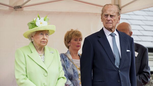 FILE PHOTO: Queen Elizabeth II and Prince Philip, Duke Of Edinburgh attend the unveiling of the Robert Quigg VC memorial statue in Bushmills village - Sputnik International