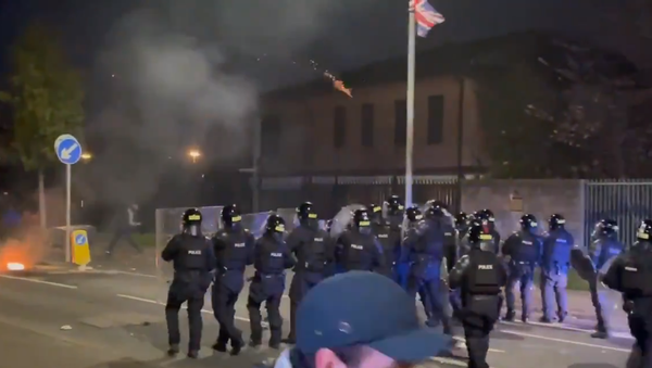 Screenshot from a video showing a stand-off between the protesters and police officers in Belfast, Northern Ireland - Sputnik International