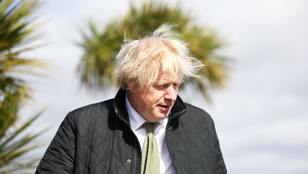 Britain's Prime Minister Boris Johnson visits the Haven Perran Sands Holiday Park in Perranporth, Cornwall, Britain April 7, 2021. - Sputnik International