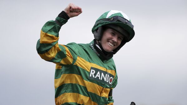 Rachael Blackmore ridding Minella Times celebrates after winning the Randox Grand National Handicap Chase on the third day of the Grand National Horse Racing meeting at Aintree racecourse, near Liverpool, England, Saturday April 10, 2021. - Sputnik International