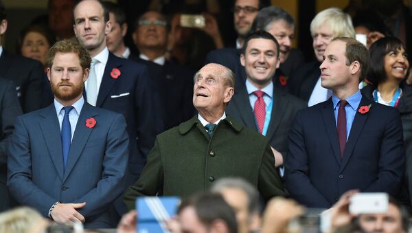 Britain's Prince Harry, Prince Philip and Prince William (L-R) attend the final of the Rugby World Cup between New Zealand and Australia at Twickenham in London, Britain, 31 October 2015. - Sputnik International