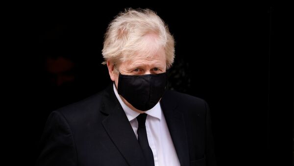 Britain's Prime Minister Boris Johnson leaves Downing Street in London, Britain, April 12, 2021 - Sputnik International