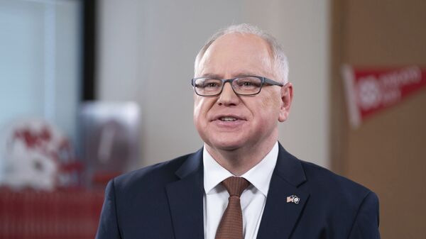 Minnesota Gov. Tim Walz delivers his third State of the State address Sunday, March 28, 2021 from his old classroom at Mankato West High School in Mankato, Minn. - Sputnik International