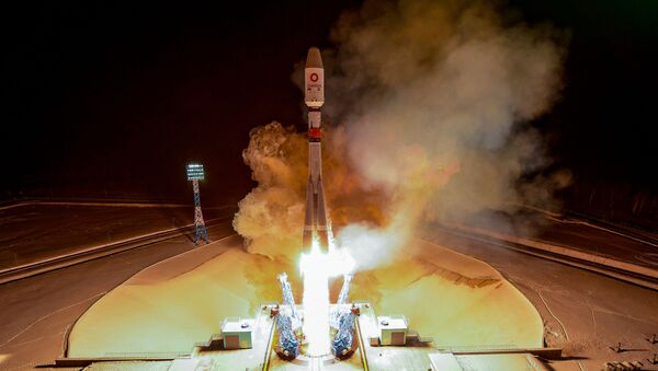 A Soyuz-2.1b rocket booster with 36 British OneWeb satellites blasts off from the launch pad at the Vostochny cosmodrome outside the city of Uglegorsk, about 200 kms from the city of Blagoveshchensk in the far eastern Amur region, on December 18, 2020. - Sputnik International