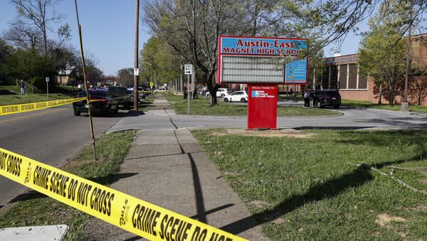 Knoxville police work the scene of a shooting at Austin-East Magnet High School Monday, April 12, 2021, in Knoxville, Tenn. - Sputnik International