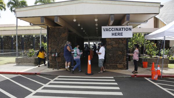 People line up to get COVID-19 vaccinations in Lihue, Hawaii, Wednesday, March 3, 2021. - Sputnik International
