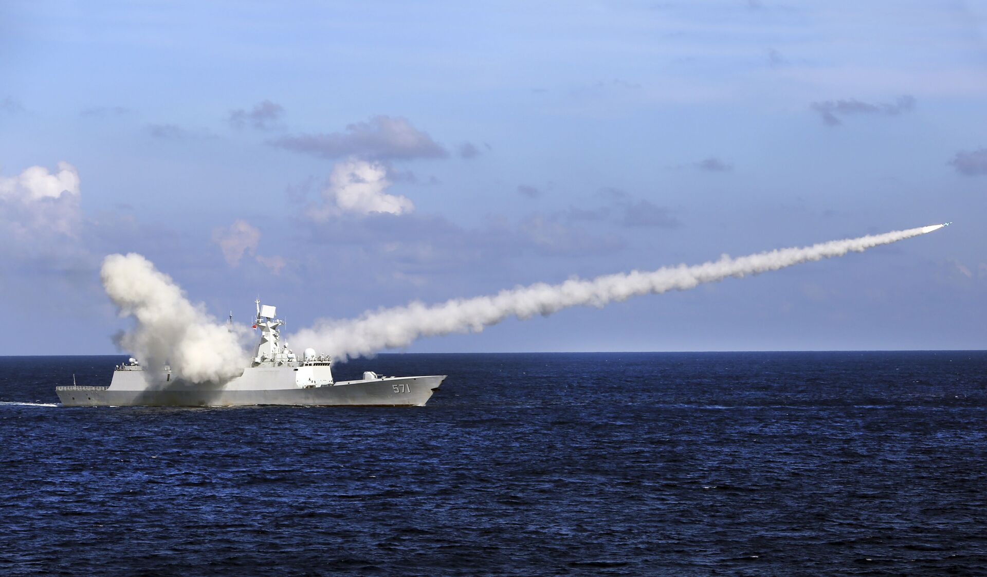 In this Friday, July 8, 2016, file photo released by Xinhua News Agency, Chinese missile frigate Yuncheng launches an anti-ship missile during a military exercise in the waters near south China's Hainan Island and Paracel Islands. China is holding another round of military drills in the South China Sea amid an uptick in such activity in the area highlighting growing tensions - Sputnik International, 1920, 07.09.2021