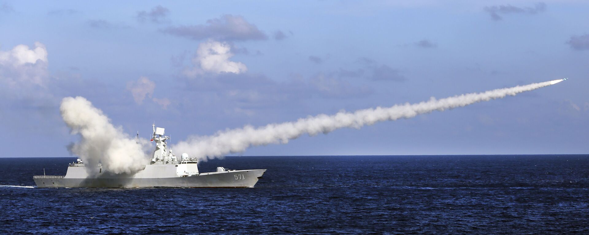 In this Friday, July 8, 2016, file photo released by Xinhua News Agency, Chinese missile frigate Yuncheng launches an anti-ship missile during a military exercise in the waters near south China's Hainan Island and Paracel Islands. China is holding another round of military drills in the South China Sea amid an uptick in such activity in the area highlighting growing tensions - Sputnik International, 1920, 09.10.2021