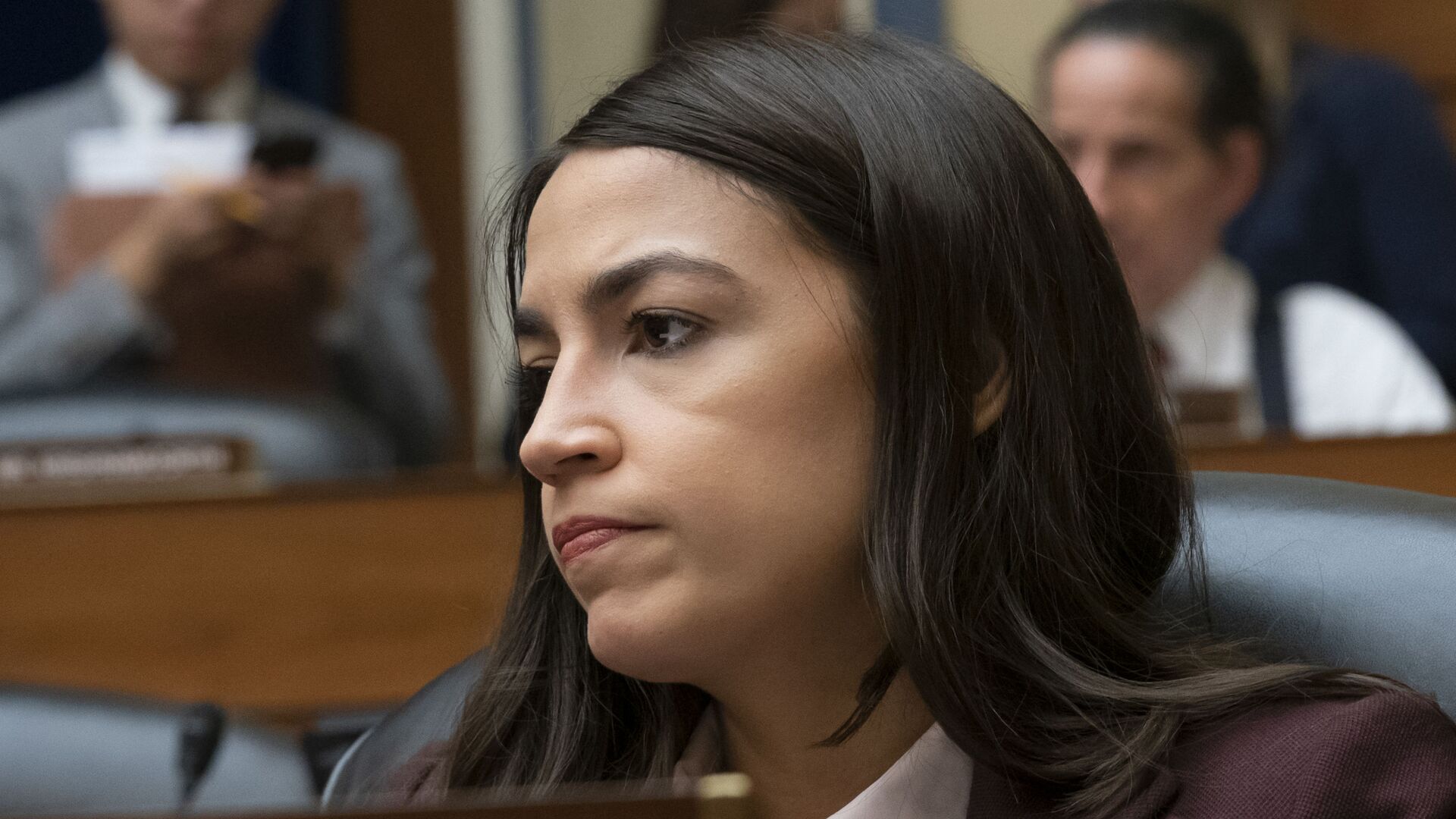 Rep. Alexandria Ocasio-Cortez, D-N.Y., attends a House Oversight Committee hearing on high prescription drugs prices shortly after her private meeting with Speaker of the House Nancy Pelosi, D-Calif., on Capitol Hill in Washington, 26 July 2019 - Sputnik International, 1920, 09.06.2021