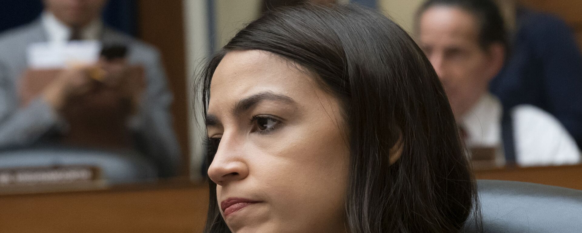 Rep. Alexandria Ocasio-Cortez, D-N.Y., attends a House Oversight Committee hearing on high prescription drugs prices shortly after her private meeting with Speaker of the House Nancy Pelosi, D-Calif., on Capitol Hill in Washington, Friday, July 26, 2019 - Sputnik International, 1920, 11.01.2023