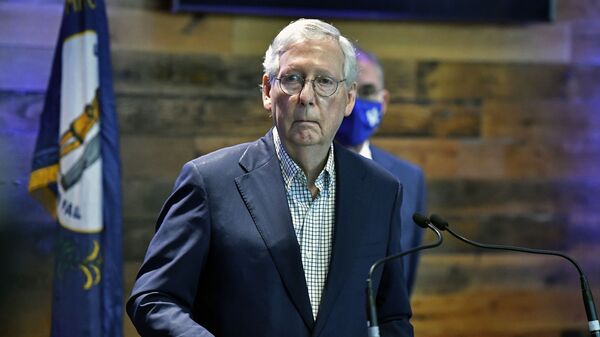 Senate Minority Leader Mitch McConnell, R-Ky., listens to a reporter's question during a news conference at a COVID-19 vaccination site in Lexington, Ky., Monday, April 5, 2021. - Sputnik International