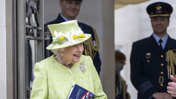 Britain's Queen Elizabeth II during a visit to the CWGC, the Commonwealth War Graves Commission Air Forces Memorial to attend a service to mark the Centenary of the Royal Australian Air Force, in Runnymede, England, Wednesday March 31, 2021 - Sputnik International