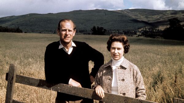 In this Sept. 1, 1972 file photo, Britain's Queen Elizabeth II and Prince Philip pose at Balmoral, Scotland, to celebrate their Silver Wedding anniversary. Prince Philip, the irascible and tough-minded husband of Queen Elizabeth II who spent more than seven decades supporting his wife in a role that both defined and constricted his life, has died, Buckingham Palace said Friday, April 9, 2021 - Sputnik International