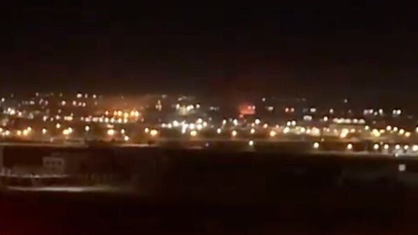Screenshot captures moment in which an explosion broke out along Iraq's Erbil International Airport on Wednesday, April 14. Reports later confirmed that the incident was part of a three-pronged strike against Turkish Armed Forces in Iraqi Kurdistan. - Sputnik International